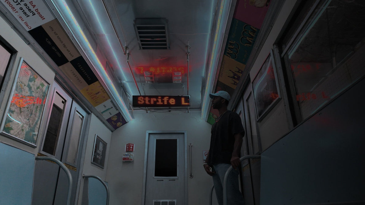 Brandon Strife standing inside a train